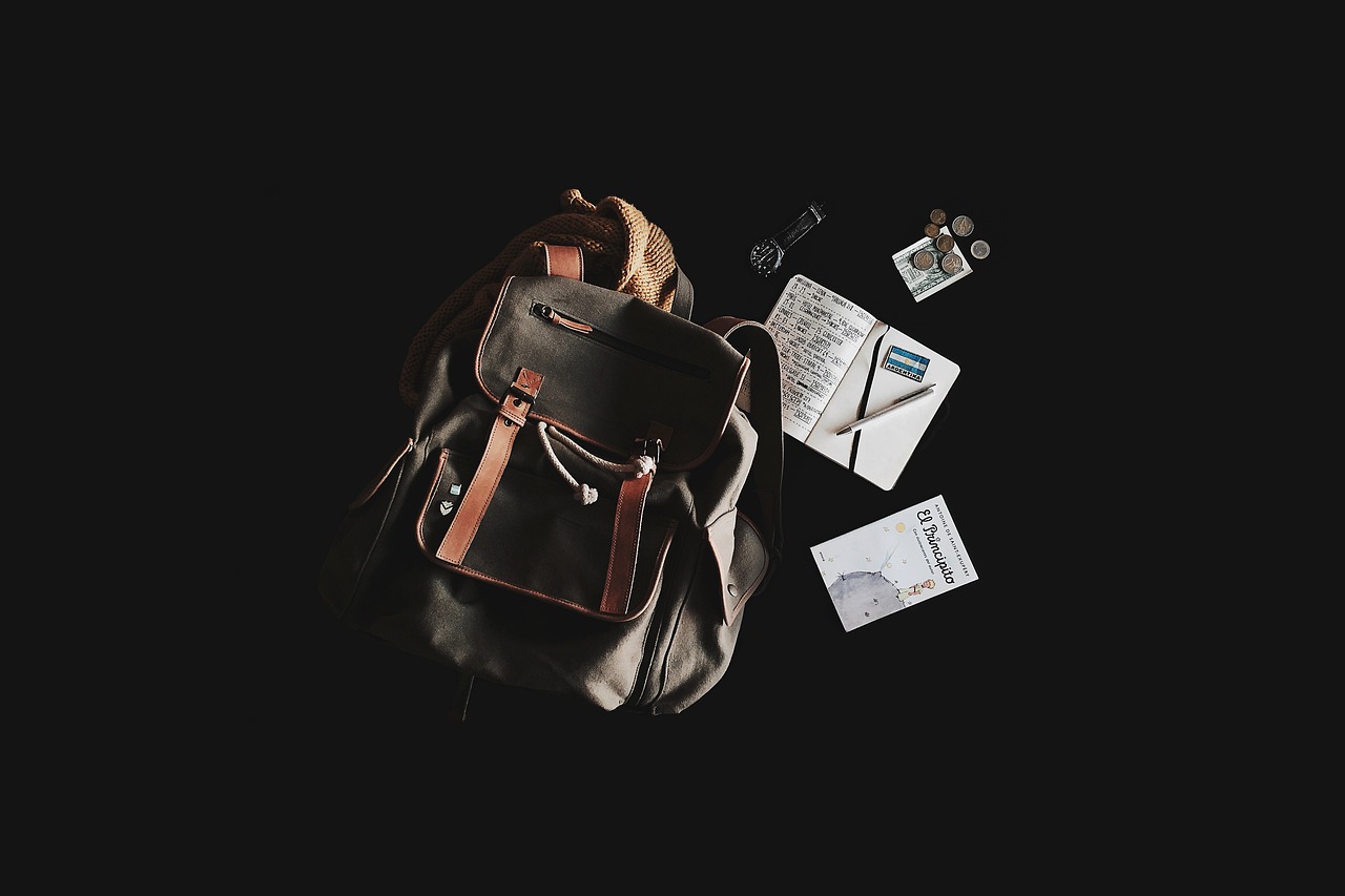 our-story backpack, book, travel bag, notebook, backpacking, contents, travel, journey, flat lay, studio photography, still life, backpack, backpack, backpack, backpack, backpack